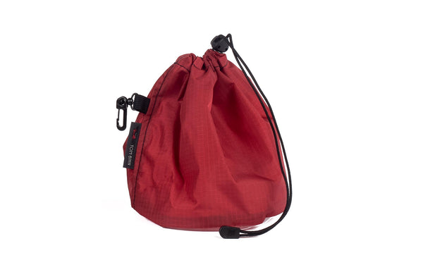 A Medium, clear-bottomed Yarn Stuff Sack in Sangria (red with light red grid) 210 Cerylon.